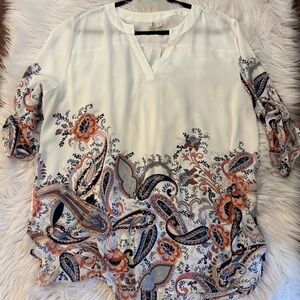 Vibrant peach  capris and lovely Cato brand top. Capris are Ruby Red  brand